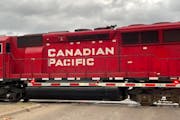 A Canadian Pacific train in downtown St. Paul last month. Canadian Pacific told transportation regulators it will close its U.S. headquarters in Minne