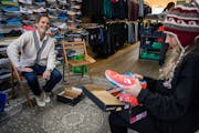 Paul Horan of Gear Running Store helped Laurel Hoch pick out a pair of sneakers. He said his business is on track to beat 2019 numbers.
