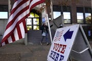 Voters emerge from Sabathani Community Center after casting their ballots during municipal elections Tuesday, Nov. 2, 2021, in Minneapolis, Minn.] DAV