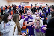 Chaska fans and students greeted Gophers commit Mallory Heyer (24) after her team’s state tournament quarterfinal victory against Stillwater in Marc