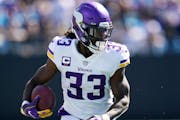 Minnesota Vikings running back Dalvin Cook (33) runs against the Carolina Panthers during the first half of an NFL football game, Sunday, Oct. 17, 202