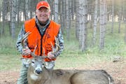 evin Hinrichs, 61, of Bloomington, with the 10-point buck he shot on opening day of the 2021 firearms deer season. He didn’t miss when his opportuni