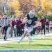 Bethel quarterback Jaran Roste scored one of his two rushing touchdowns against Augsburg on Nov. 6.