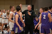 St. Thomas men’s basketball coach Johnny Tauer congratulated his team after they scrimmaged as part of “Hoops Hysteria” on Nov. 4.
