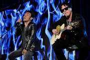 Arnel Pineda, left, has been singing with Neal Schon and Journey since 2007.