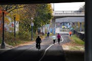 Bicyclists and runners navigated the repaved pathway along the Midtown Greenway in Minneapolis on Nov. 9.