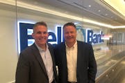 Executive Vice President Todd Lee and CEO Michael Solberg outside Bell Bank’s new City Center office in downtown Minneapolis.