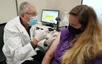 Minnesota is preparing to expand COVID-19 vaccine booster access to all adults this week, with or without federal backing.