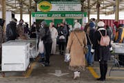 Shoppers and vendors were bundled up at the Minneapolis Farmers Market in January 2021.