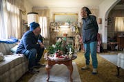 Pete Magnuson chatted with Marshie Allen in her home while making her Meals on Wheels delivery on Thursday in Minneapolis.