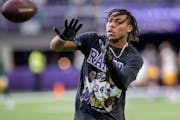 Vikings receiver Justin Jefferson warmed up in a Randy Moss T-shirt before Sunday’s game against the Packers. Then he tied another one of Moss’ re