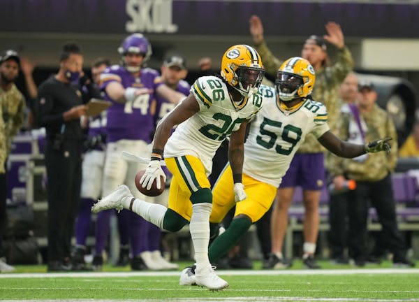 Green Bay Packers free safety Darnell Savage (26) reacted after he intercepted a pass meant for Minnesota Vikings wide receiver Justin Jefferson (18) 