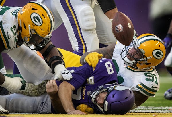 Vikings quarterback Kirk Cousins fumbled when he was sacked in the third quarter, but it was recovered by a teammate, one of several near-turnovers ag