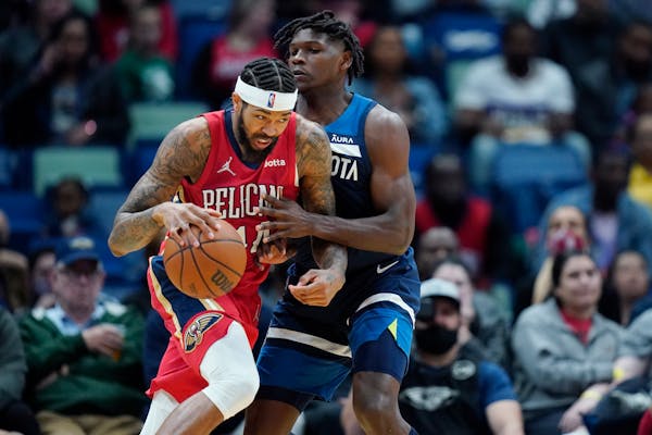 Pelicans forward Brandon Ingram tried to drive to the basket against Timberwolves forward Anthony Edwards on Monday.