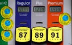 High gas prices are posted at a full service gas station in Beverly Hills, Calif., Nov. 7. 
