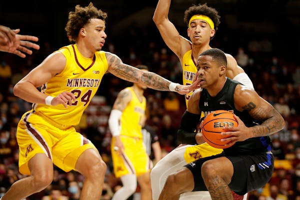 Guard Sean Sutherlin (24) led the Gophers with 19 points off the bench against Purdue Fort Wayne on Friday, making all seven of his shots from the fie