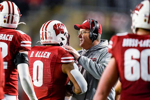 Wisconsin coach Paul Chryst congratulated running back Braelon Allen on a touchdown against Nebraska last week.