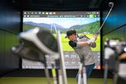 Tommy Kramer tested a driver during a private fitting at 2nd Swing golf store in Minnetonka. Sales companywide jumped 15% in 2020 and are on pace to i