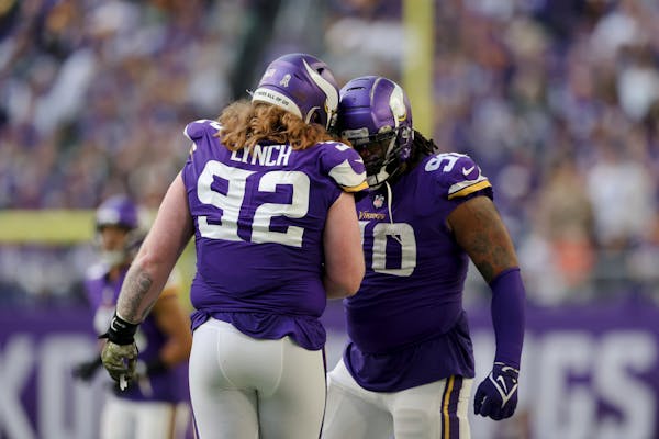 Vikings defensive tackles James Lynch and Sheldon Richardson.