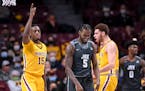 Gophers forward Charlie Daniels (15) reacted after a turnover by Jacksonville forward Bryce Workman (5) during the first half Nov. 24 at Williams Aren