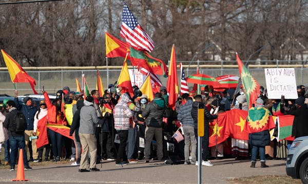 Groups of Tigray protesters gathered across from Dakota County Technical College in Rosemount before President Joe Biden arrived.