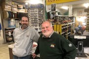 Darryl Weivoda, right, who has owned North End Hardware for more than 40 years, is selling it to long-time employee John Guion.