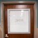 Hand-written warnings indicate rooms in the emergency department of St. Cloud Hospital outfitted with negative airflow systems to prevent the spread o