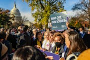 Several members of Congress gather with abortion-rights supporters during a rally outside the U.S. Supreme Court in Washington on Wednesday, Dec. 1, 2