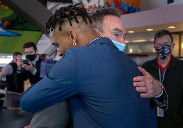 Byron Buxton hugged Paul Molitor, his first Twins manager, after a press conference Wednesday at Target Field.
