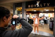 Gophers men’s basketball player Parker Fox, who’s raked in nearly $10,000 since July, posed for a promotional photo outside the Royalty store at M