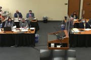 This screen grab from video taken at the Hennepin County Courthouse shows the prosecution, left, and the defense during jury selection Friday in the t