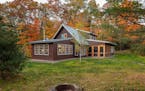 Wisconsin lakeshore 'Campfire' cabin has cozy chalet theme