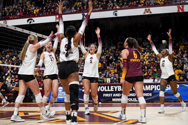 The Gophers celebrated after winning a point against Stanford in the second round of the NCAA tournament on Saturday at Maturi Pavilion.