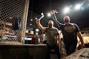 Dustin Kerr, left, and David Lewis will compete in dual hatchet throwing at the World Axe Throwing Championships this weekend.