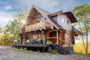 Secluded $900K Wisconsin log cabin 'retreat' offers lake views, nearby amenities