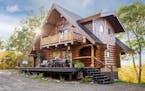 Secluded $900K Wisconsin log cabin 'retreat' offers lake views, nearby amenities