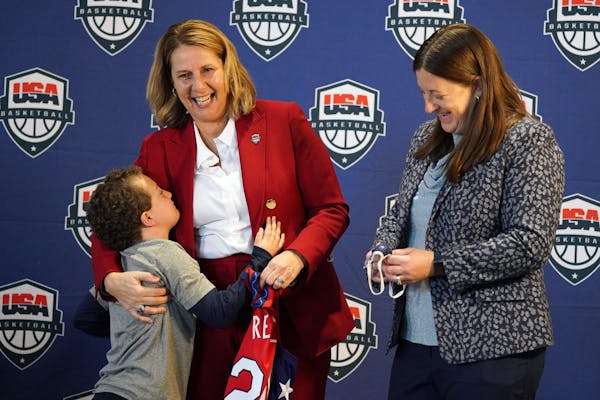 Cheryl Reeve shared the stage with wife Carley Knox and son Oliver on Wednesday as Reeve was introduced as the next women’s head coach of USA Basket