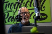 Philip Gracia, co-director at Frogtown community radio station 94.1FM WFNU, chats before hosting his regular show on Friday, Dec. 10, 2021 in St. Paul