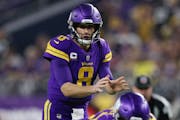 Minnesota Vikings quarterback Kirk Cousins (8) in action during the second half of an NFL football game against the Pittsburgh Steelers, Thursday, Dec
