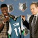 In this June 26, 2009 photo, Minnesota Timberwolves David Kahn, right, president of basketball operations, presents a jersey to first round draft pick