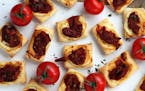 Tomato Jam Tartlets can be made in advance and served warm or at room temperature.