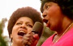 Mavis Staples, left, and Mahalia Jackson tear it up in “Summer of Soul.” CREDIT: Searchlight Pictures