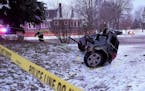 A vehicle sits in two pieces after a stolen vehicle crashed on Thursday, Dec. 9, 2021 in Minneapolis, Minn. The fatal crash in Minneapolis early Thurs
