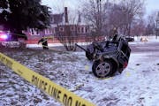 A stolen SUV sat in two pieces after it crashed on Dec. 9 in Minneapolis. The fatal crash followed a police pursuit of an SUV that was reportedly stol