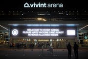 A sign advised fans to have their vaccine card ready is shown at Salt Lake City’s Vivint Arena before a Jazz game last month. It’s one of the many