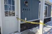 Police tape on Monday marked the Moorhead home where seven people died on the city’s south side.