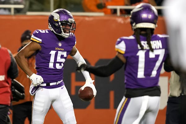 Vikings wide receiver Ihmir Smith-Marsette celebrated his touchdown during the second half Monday against Chicago.