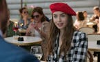 Emily (Lily Collins) the Chicagoan settles further into French life in the second season of “Emily in Paris.” 