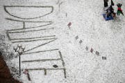“Daunte” is written in the snow Wednesday outside the Hennepin County Government Center during the jury deliberations in the trial of ex-Brooklyn 