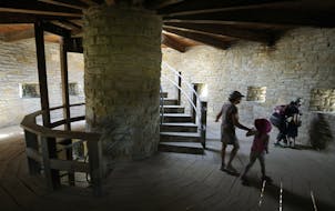 A family tours the Round Tower in June 2021.